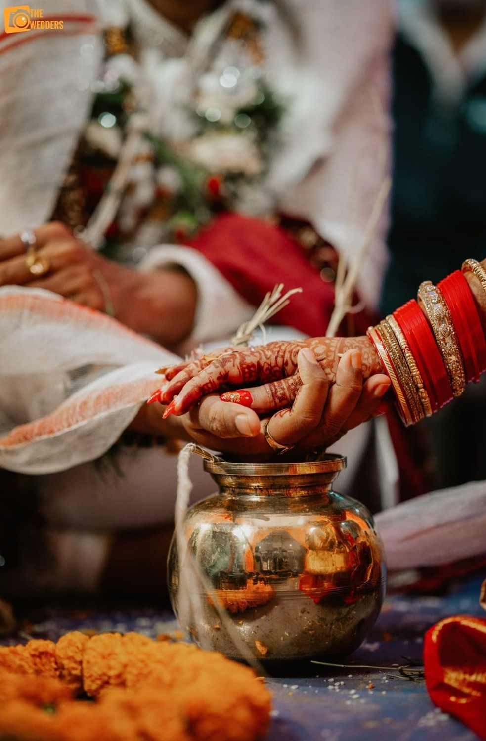 Hatha Ganthi hands tied with mango leaves at the mandap